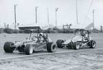 Wolfman, exhibiting a bit of oversteer, leads Don Zahn, Lubbock, ca. 1974.